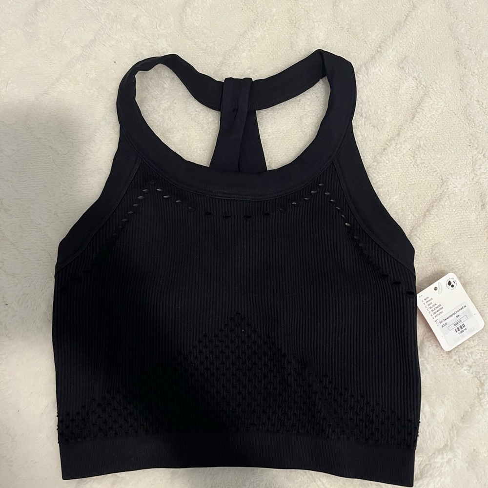 Free people black tank top.